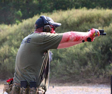 Matt Roberts pointing a handgun during SWAT training